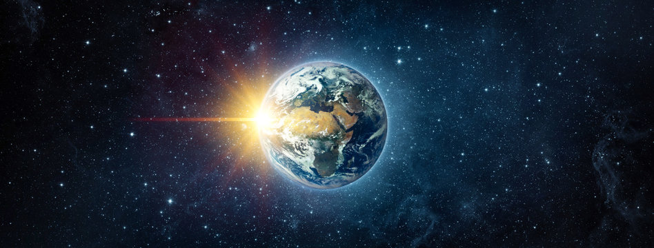 Panoramic view of the Earth, sun, star and galaxy. Sunrise over planet Earth, view from space. Concept on the theme of ecology, environment, Earth Day. Elements of this image furnished by NASA.