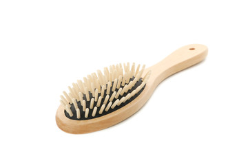 Wooden hair brush isolated on white background
