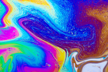 Psychedelic abstract formed by light reflecting off soap bubble