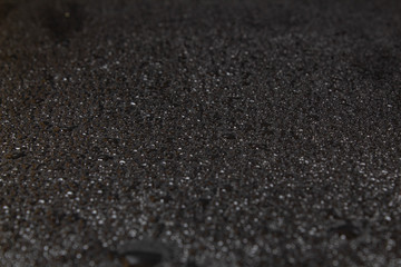 Black stone surface in water cameos, Dark natural background