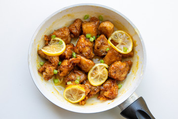 Sticky Chinese Lemon Chicken on the plate