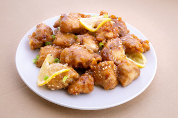 Sticky Chinese Lemon Chicken on the plate