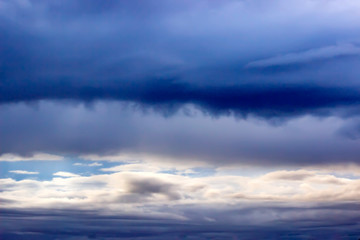 Dramatic sky with clouds on sunset evening. Natural abstract background.