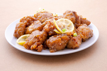Sticky Chinese Lemon Chicken on the plate