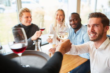 Waitress serves young people as guests