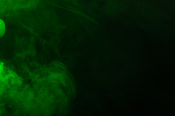 Green steam on a black background.