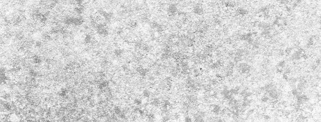 White background of a texture of cement wall, stone and concrete, with some little moss - Bright stage background - Large panoramic format