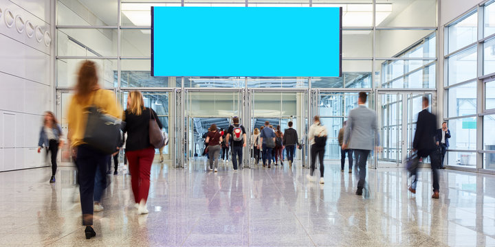 Blank billboard in progress of a trade fair or event