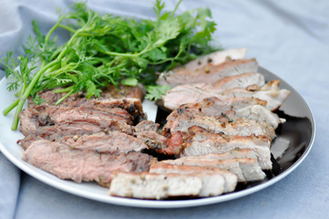 grilled pork , pork steak and beef steak