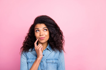 Fototapeta premium Close up photo of dreamy afro american girl look copyspace think thoughts difficult question touch finger chin wear casual style clothing isolated over pink color background