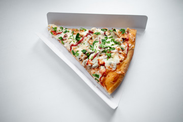 slice of delicious pizza delivered home