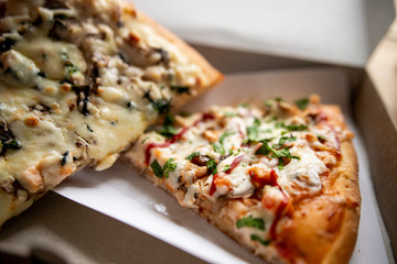 slice of delicious pizza delivered home