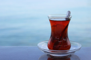 Glass of Turkish Tea by the Sea