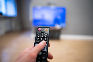 Watching tv and using remote control