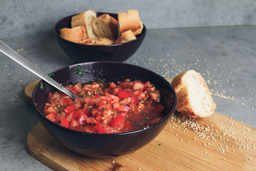 Tomato hash with paprika onion quinoa leaves