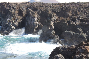 waves on the rocks lanzarote
