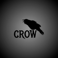 Obraz premium Black silhouette of crow ith lettering 