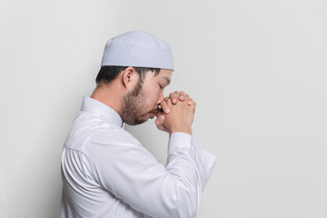 Portrait of smart handsome muslim man on white background,Ramadan festival concept