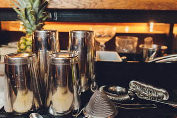 Classic bar cocktail shaker, bartender tools, a set of equipmen, Selected focus.