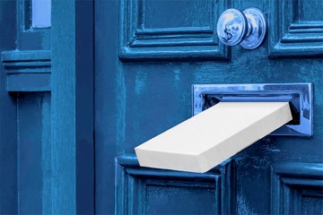 Sending a Gift In The Post.Postal box the parcel is delivered through the parcel door opening.White...