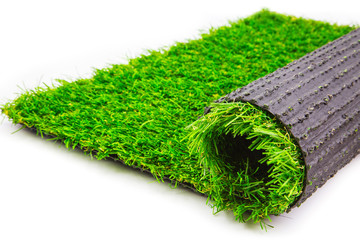 roll of artificial grass mat isolated on a white background