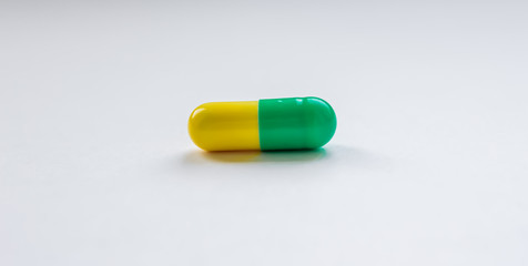One medical capsule on white background