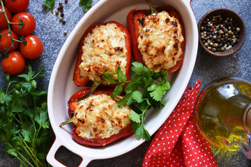 Baked stuffed bell peppers on the kitchen table.