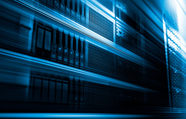 3D rendering big data computing concept in data storage systems, blur in motion, server with hard drives in data center