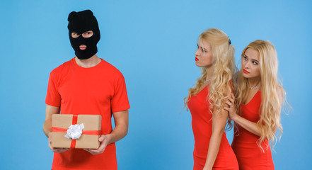 Two attractive purposeful persistent girls knock out a gift from a rogue, gift theft