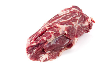 Fresh raw pork neck meat isolated on white background. Pork belly on a white background. Raw pork neck boneless, close-up, isolated.