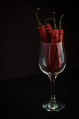 Red chilly pepper on vintage background