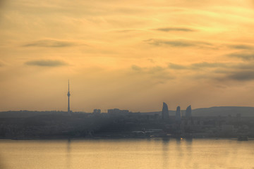 Naklejka premium Baku panorama in golden sunset