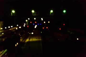 Blurred lights of the railway station. Bokeh background