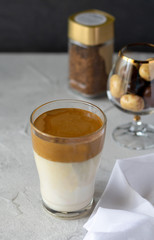 Dalgona coffee, new Korean drink, instant coffee mixed with sugar and added to iced milk. Trendy beverage