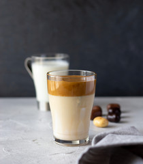 Dalgona coffee, new Korean drink, instant coffee mixed with sugar and added to iced milk. Trendy beverage