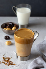 Dalgona coffee, new Korean drink, instant coffee and sugar whipped cream with iced milk. Trendy beverage
