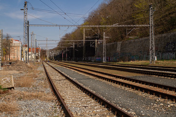 Fototapeta na wymiar train tracks in prague in spring in czech republic and architecture around