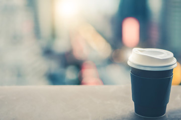 Background of black coffee cup refreshing enjoy morning before work from home video conference call meeting with cafe rooftop traffic view from window during coronavirus covid city lockdown quarantine