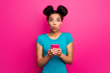 Photo of pretty shocked millennial dark skin lady hold telephone hands check blog bad comments open...
