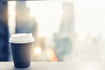 Background of black coffee cup refreshing enjoy morning before work from home video conference call meeting with cafe rooftop traffic view from window during coronavirus covid city lockdown quarantine