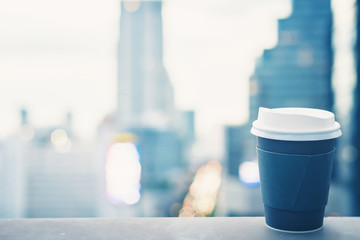 Background of black coffee cup refreshing enjoy morning before work from home video conference call meeting with cafe rooftop traffic view from window during coronavirus covid city lockdown quarantine