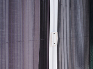 white frame door with mosquito net wire screen