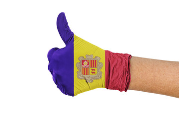 Andorra flag on a medical glove showing thumbs up sign