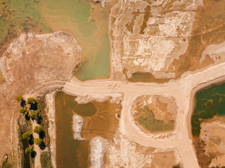 Aerial drone shot of the sand mining site at the Lingemeer lake, Gelderland, the Netherlands