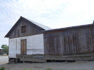 Old wooden structure with loose floors at Randsburg, one of the mining ghost towns in California.