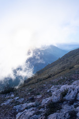 clouds over the mountains in a cold winter