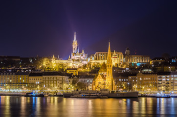 Budapest by night from danube river, Hungary.
