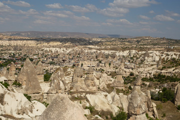 Panoramic view of rocky landscape with blue sky