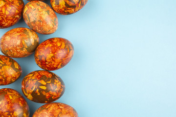 Easter eggs on blue  background.