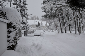 Streets of the suburbs of Munich in winter, covered with snow